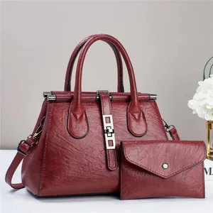 Retro burgundy large shoulder bag and matching pouch set with textured leather finish