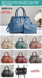 Detail view of large tote set with dimensions 28x14x20cm and litchi grain texture