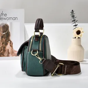 Deep green large capacity multi-pocket tote bag with brown straps and dual zippers