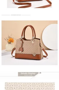Close-up of woven texture and contrast PU leather details on women handbag