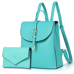 Litchi pattern faux leather backpack and envelope clutch set in Tiffany blue with gold hardware
