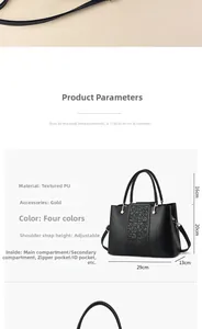 Detailed view of the black PU leather handbag with gold hardware and internal compartments