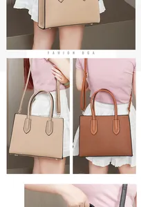 Detail view of textured PU leather handbags with golden hardware and adjustable straps