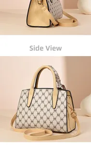 Detail view of beige monogram tote bag with silk scarf handle and detachable strap
