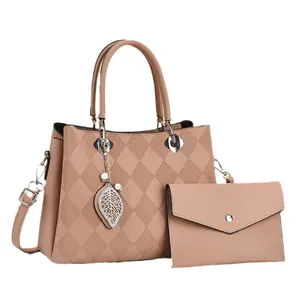 Chic beige quilted leather handbag set with leaf pendant and detachable strap