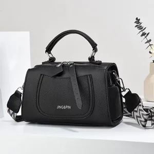 Fashion black lychee grain leather crossbody handbag with wide woven shoulder strap