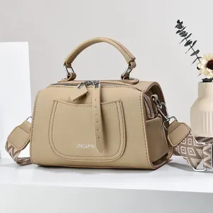 Fashionable beige Boston handbag with lychee texture and woven wide shoulder strap