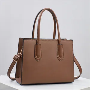 Large dark brown Saffiano leather tote bag with dual handles and gold-tone hardware