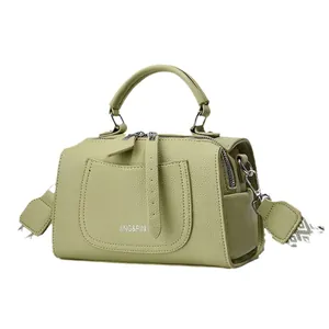 Fashionable solid color Boston bag for women in light green with lychee texture leather