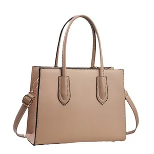 Classic beige Saffiano leather tote bag with gold hardware and slim shoulder strap