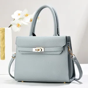 Elegant light blue-grey lychee grain leather tote bag with gold metal hardware