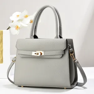 Grey lychee pattern leather tote bag with gold hardware and shoulder strap in high quality