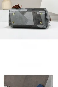 Detail view of handbag base with golden protective studs and geometric patchwork texture