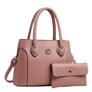 Ensemble sac à main et portefeuille rose lotus en cuir grainé avec logo K et bandoulière