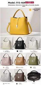 Detailed view of luxury litchi grain bucket bag with 23x12x21cm dimensions and long strap