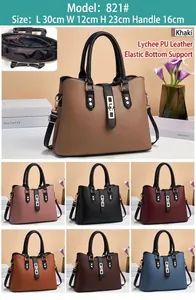 Close-up of litchi texture PU leather tote bag with interior layers and metal buckle