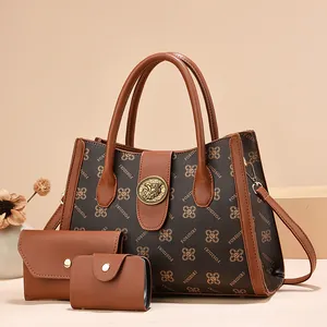 Women's monogram tote bag set with three pieces in brown leather and gold hardware