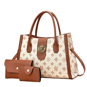 3-piece set beige floral printed tote bag with golden lion head and matching pouches