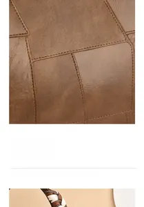 Detail of patchwork leather handbag featuring woven handles and decorative silk scarf wrap