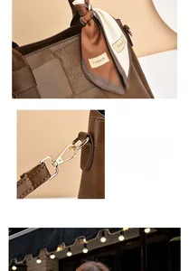 Detailed view of the brown leather stitching, silk scarf handle, and gold metal hardware
