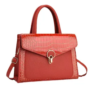 Red crocodile embossed and lychee leather handbag with golden hardware for women