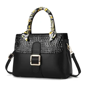 Black PU leather handbag with crocodile pattern flap and silk scarf handle decoration