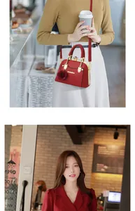 Detailed macro view of the red leather handbag featuring a 3D rose and rhinestone closure