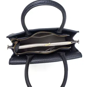 Minimalist black tote bag set with spacious interior compartments and zip pocket