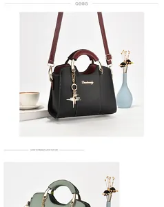 Détails de sacs à main élégants avec pendentif étoile en noir et vert clair