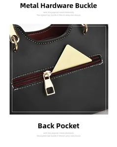 Détail du sac en cuir noir montrant le fermoir métallique et la poche zippée arrière