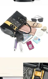 Detail of gold studs and large capacity for iPad and camera in luxury patchwork handbag