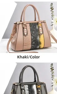 Detail view of khaki patchwork handbag featuring shiny patent and crocodile-embossed leather