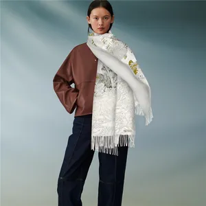 Floral cashmere blend scarf with tropical palm leaves and fringe for winter warmth