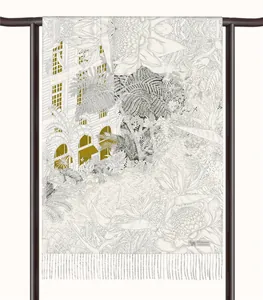 Detail of floral cashmere scarf with luxury fringe and architectural botanical prints