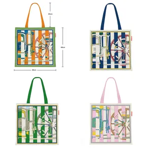 Large canvas tote bags with vintage carriage wheel prints and stripes in four color variants