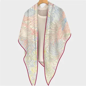Women's cashmere scarf with tropical botanical prints and red-purple contrast edges