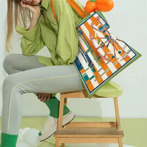 Large capacity canvas tote bag with silk scarf carriage print and orange shoulder strap