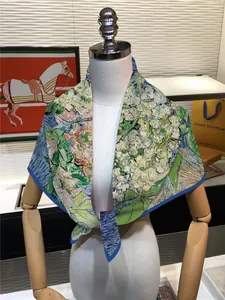 Close-up of Van Gogh oil painting silk scarf with floral patterns and blue borders
