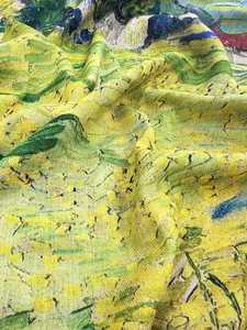 Close-up of Van Gogh oil painting scarf showing fine cashmere-like weave and vibrant colors