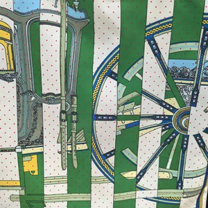 Close-up of luxury horse carriage wheel pattern on high-capacity canvas tote bag