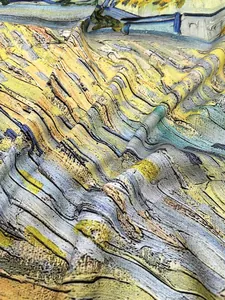 Macro shot of Van Gogh Saint-Paul Church oil painting print on woven scarf fabric