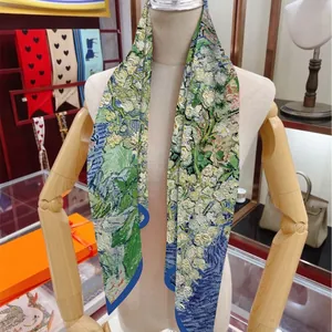 Artistic van Gogh oil painting silk scarf styled on a mannequin in a boutique setting