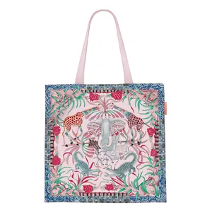 Canvas tote bag with pink handles featuring colorful elephant and giraffe illustrations
