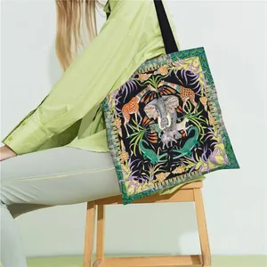 Large canvas tote bag with colorful elephant and giraffe jungle animal prints for women