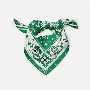 Green and white paisley silk scarf with vintage floral patterns on grey background