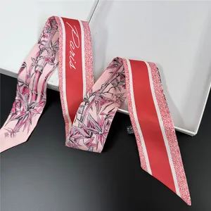 Elegant bamboo floral silk ribbon scarf with red and pink tones for handbag decoration
