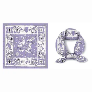 Square silk scarf with purple paisley and western horse motif in elegant fold