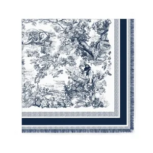Close-up of Toile de Jouy velvet square scarf with wildlife patterns and fringe trim