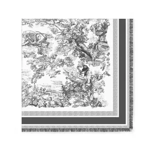 Close-up of Toile de Jouy velvet shawl with forest animal print and fringe edges
