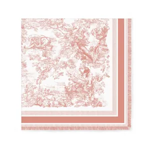 Detail of pink Toile de Jouy forest print and fine fringe on the square silk shawl